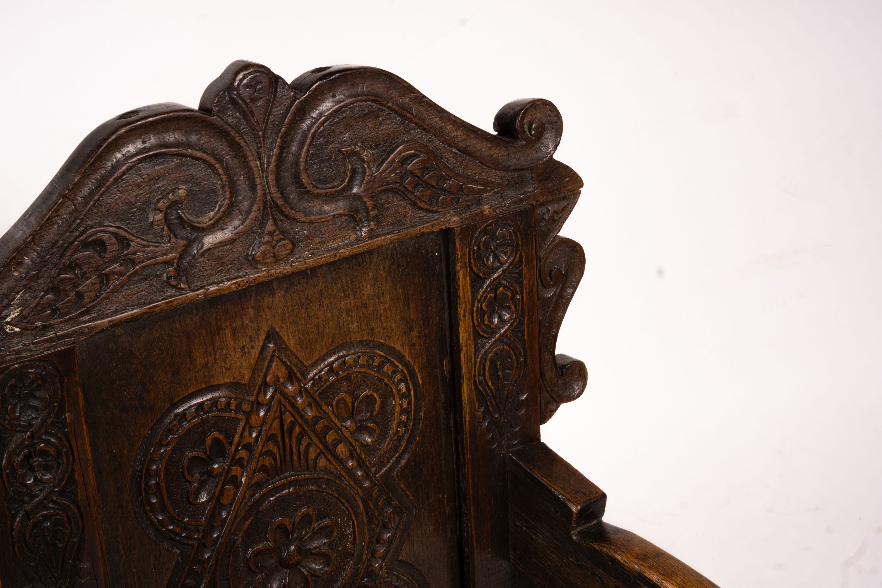 A 17th century style oak Wainscot chair, width 54cm, depth 52cm, height 104cm